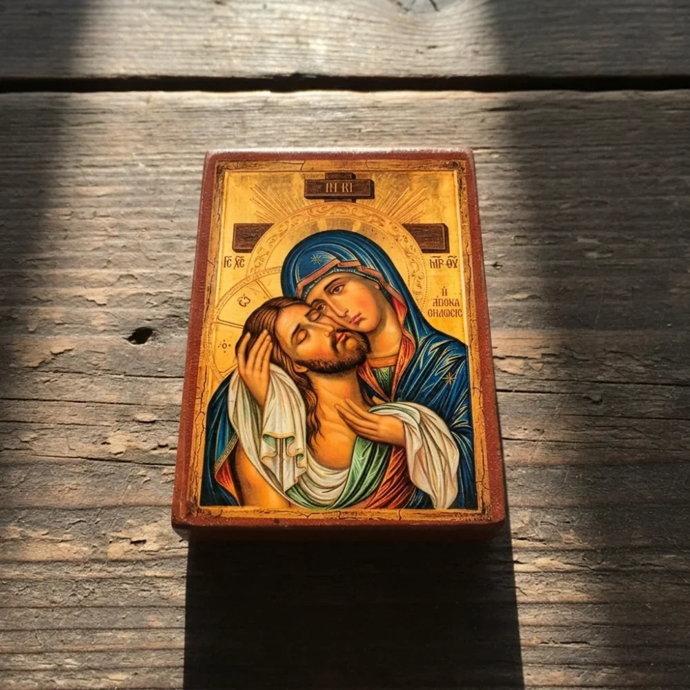 Holy Apokathelosis: Theotokos Embraces the Crucified Christ Holy Apokathelosis Orthodox wooden mounted icon showing the Theotokos embracing the Crucified Christ.