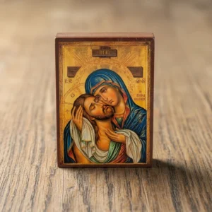 Holy Apokathelosis Orthodox wooden mounted icon showing the Theotokos embracing the Crucified Christ.
